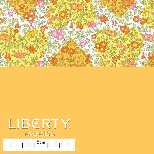 Liberty In Love Tana Lawn™ cotton fabric with pastel hearts and delicate floral motifs in yellow.