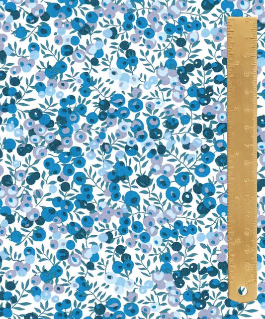 liberty print with blue berries and leaves on white background